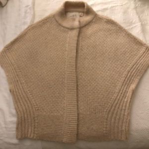 This is the sweetest layer sweater you will ever own! Soft flexible in a size!